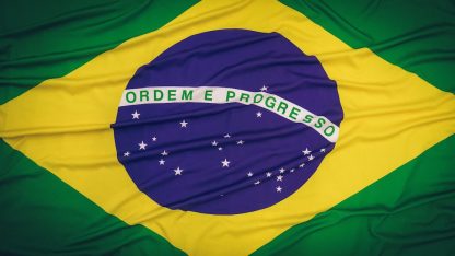Close da bandeira do Brasil em tecido ondulado com as cores verde, amarelo e azul. — Foto: Murilo Fonseca