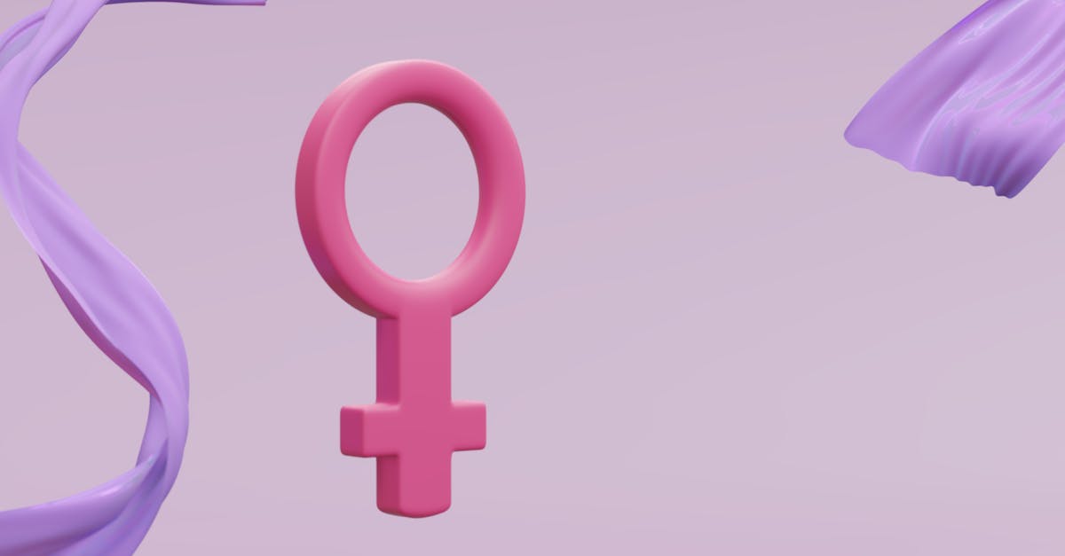 Símbolo de Vênus rosa em 3D centralizado com tecidos roxos fluidos nas laterais sobre fundo claro. — Foto: Pachon in Motion